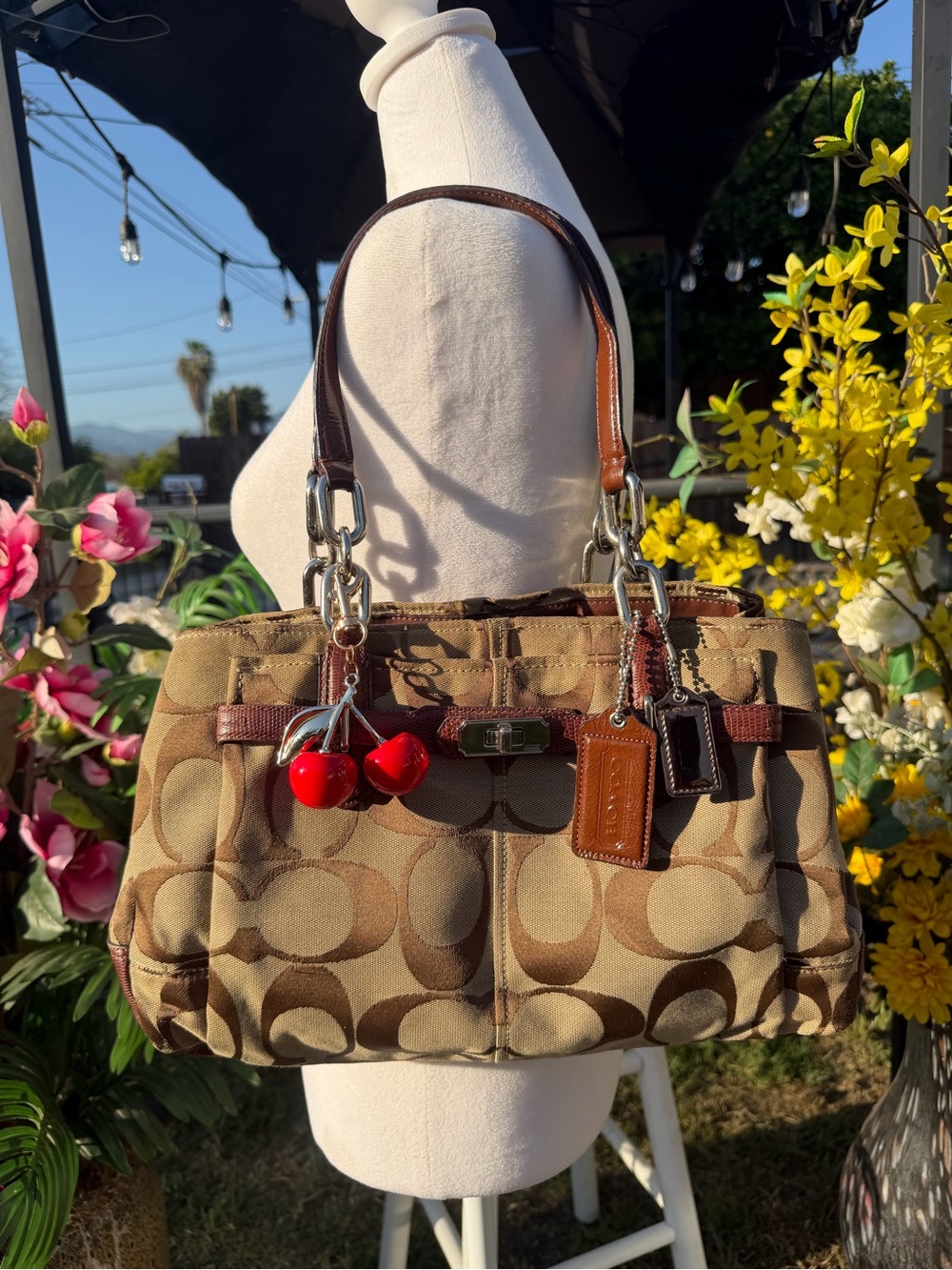 Coach Brown Signature Canvas Shoulder Bag with Red Cherry Charm